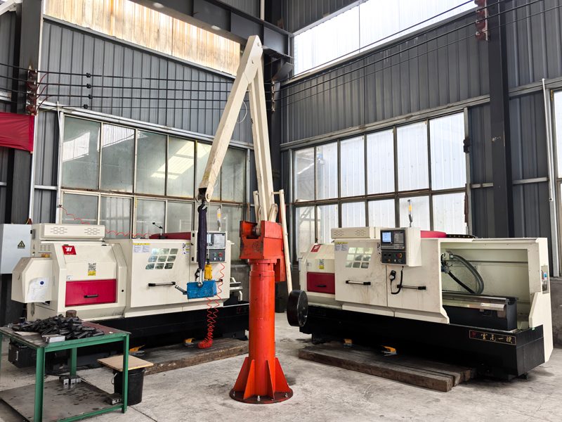 CNC lathes with part handling